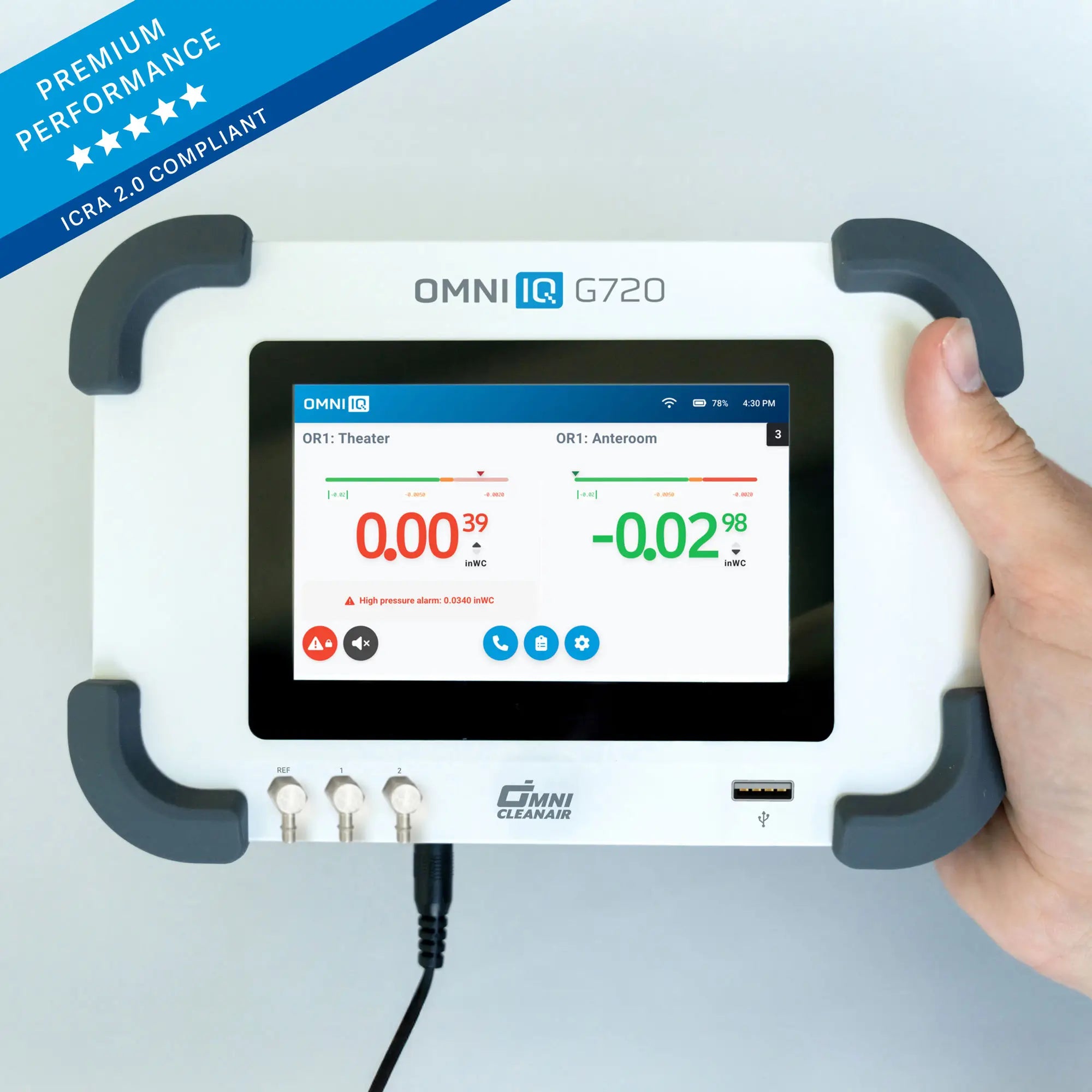 OMNI IQ G720 device held by a hand with a white background